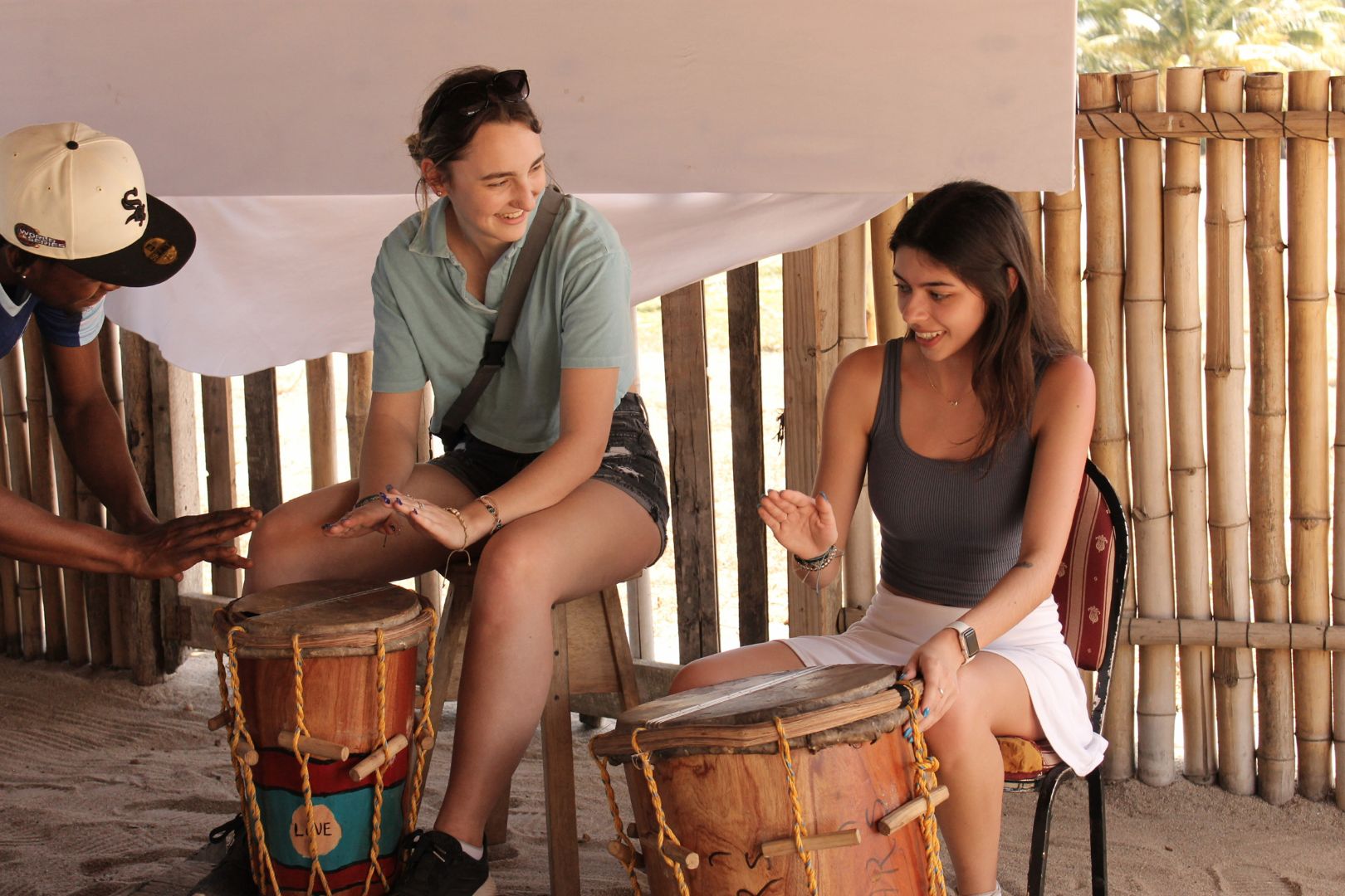 Robin learning about Garifuna drumming