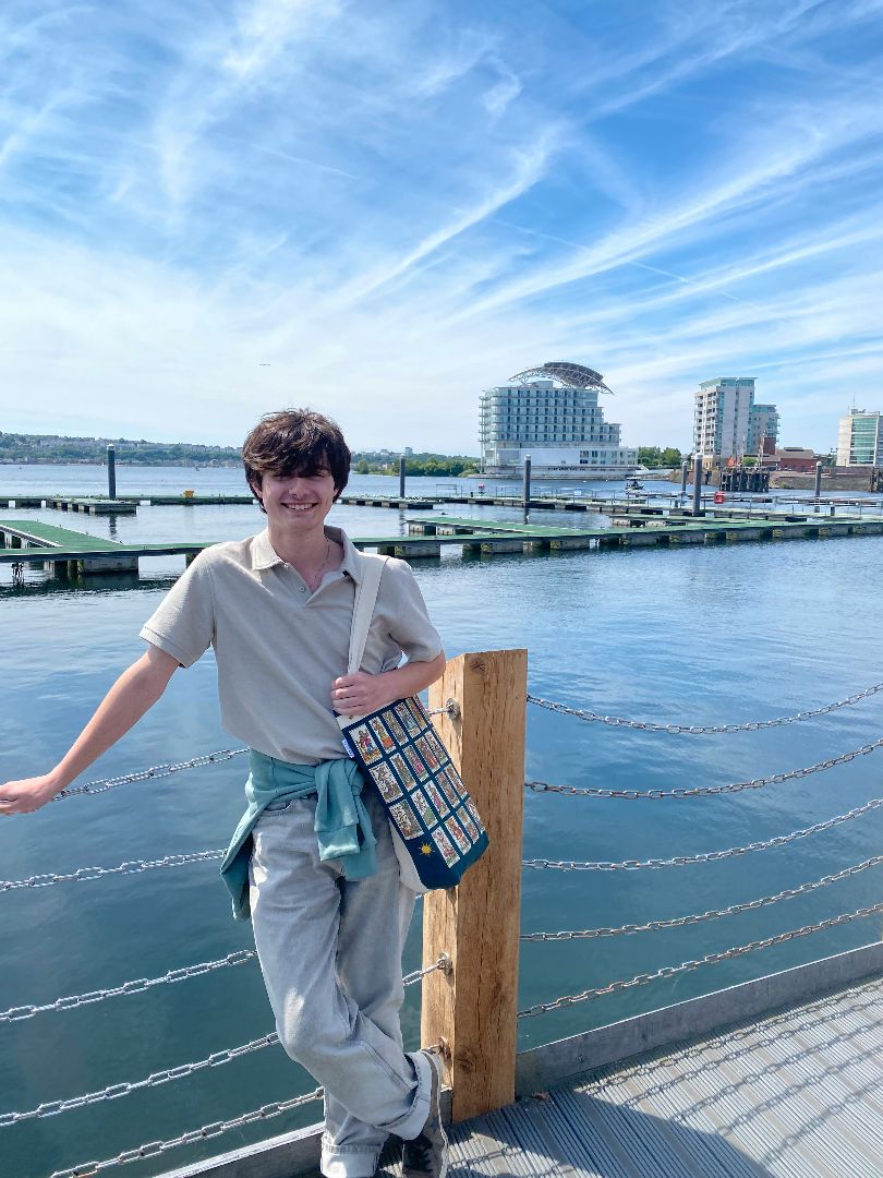 Nick standing on a dock in London