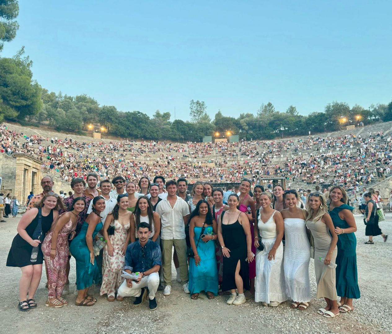 Group of students at Odeon of Herodes Atticus in Greece