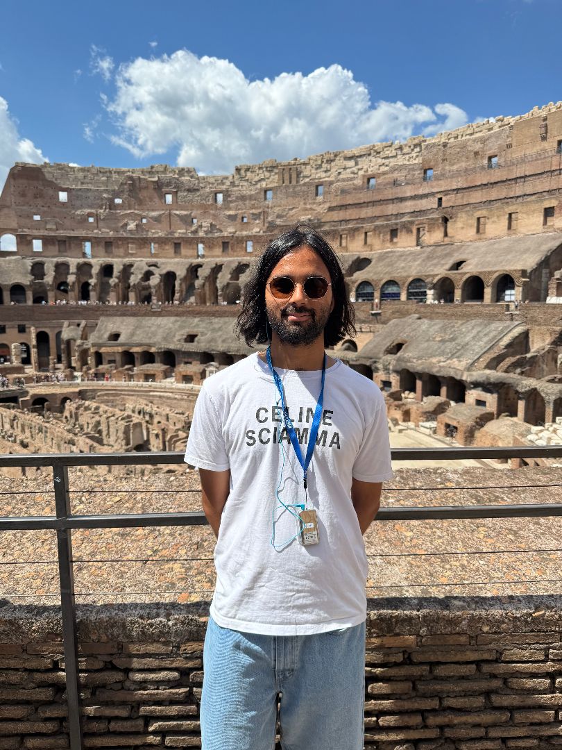 Ayushya standing inside the Colesium in Rome
