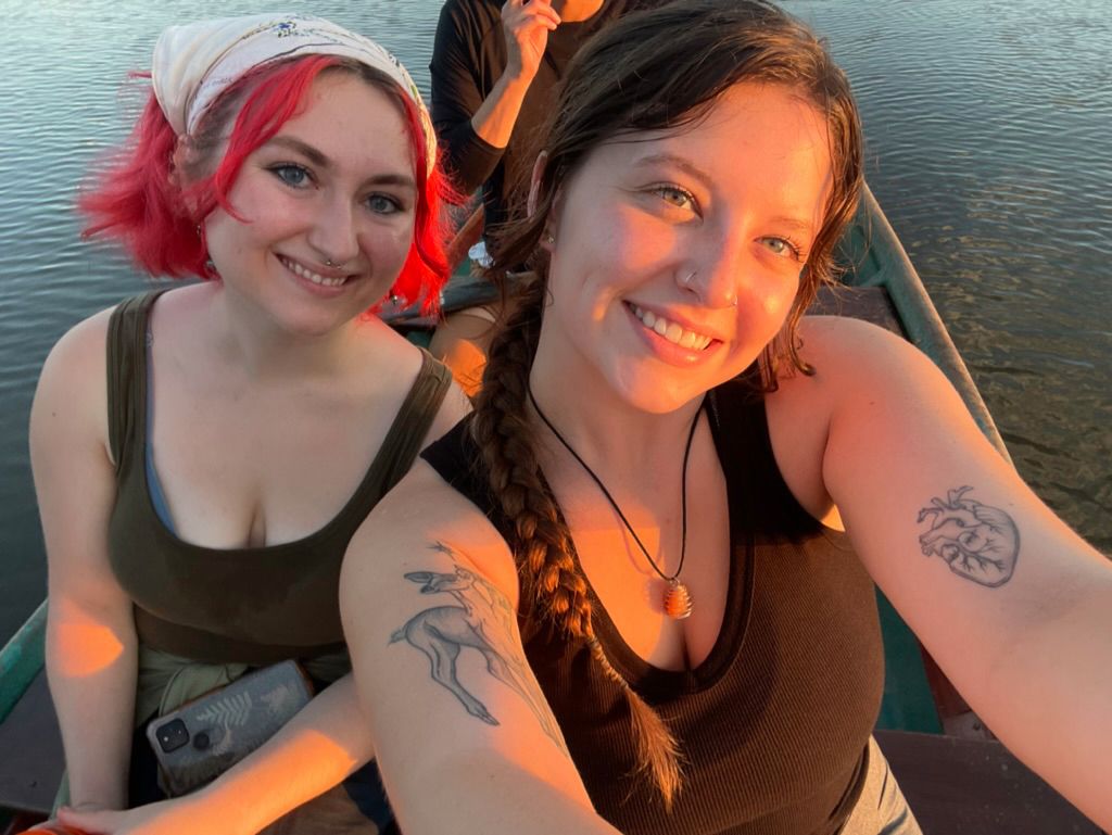 Shaelyn and friend taking a selfie on a boat in Peru