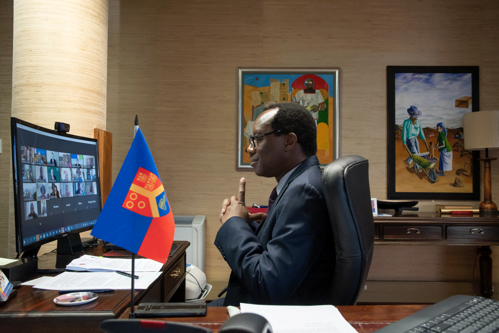 UP Vice Chancellor Kupe at his desk watching a computer screen during the virtual MOU signing.