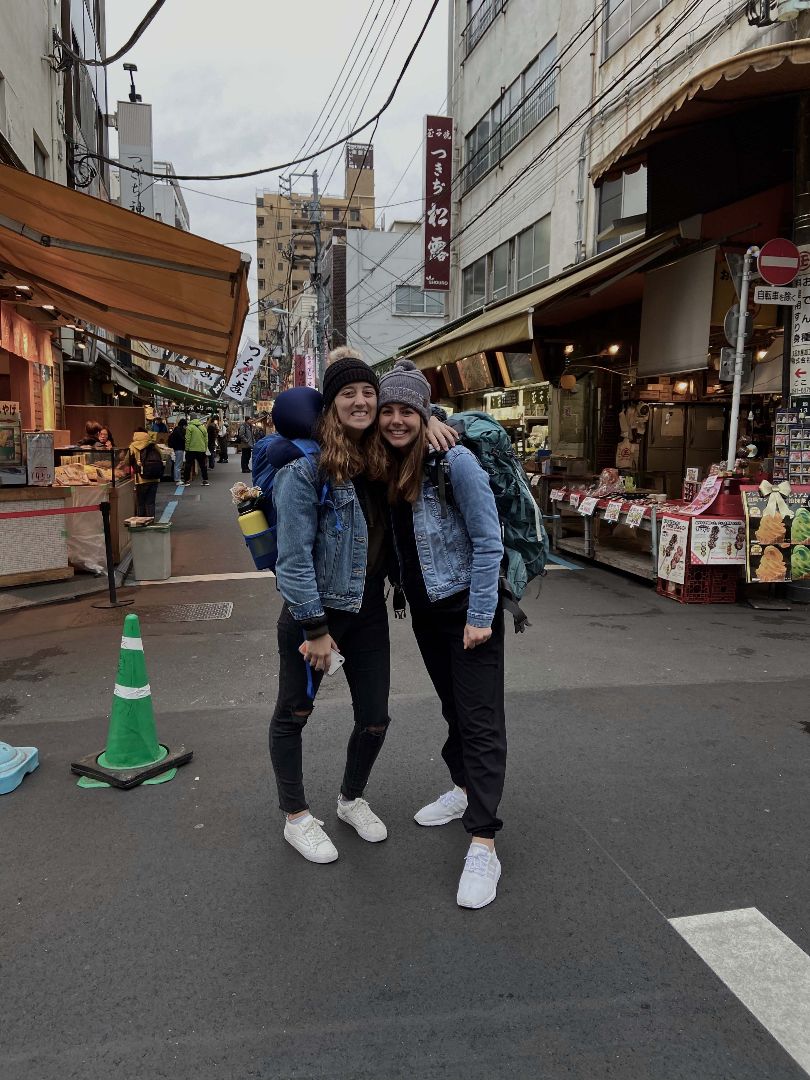 Kaitlyn and friend at local market