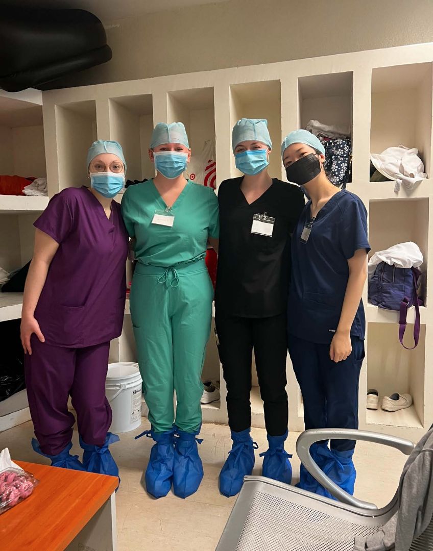 Four students in medical scrubs in Mexico