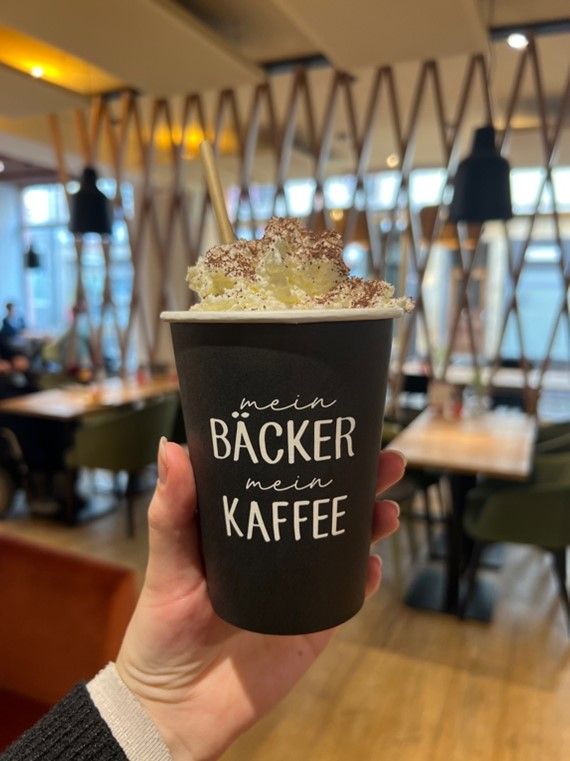photo of a coffee cup that says "mein backer, mein kaffee"