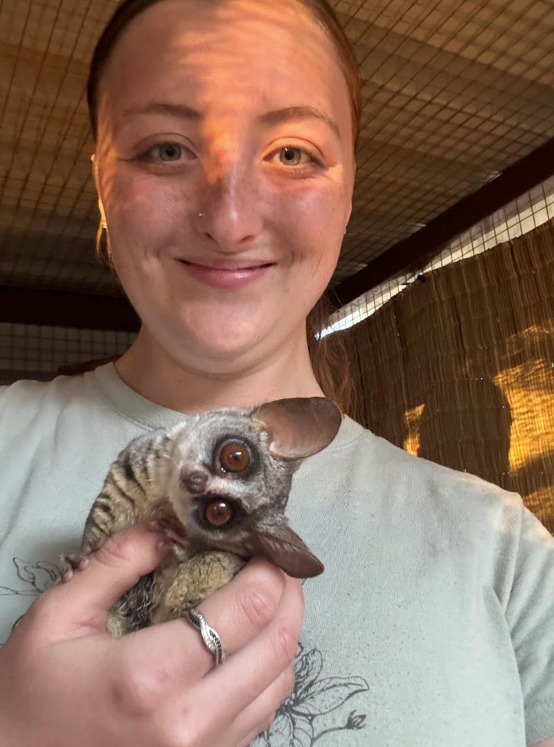Madison holding a bush baby