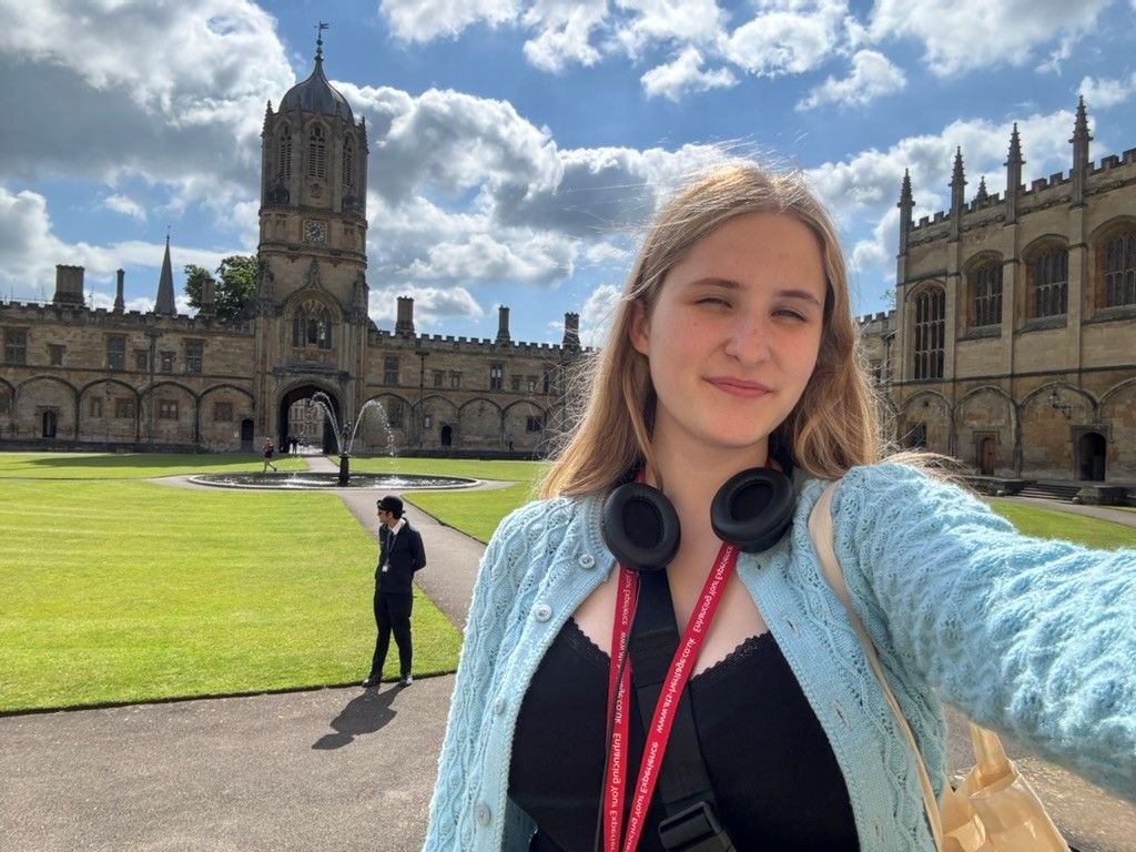 Esther taking a selfie amongst historic building in England