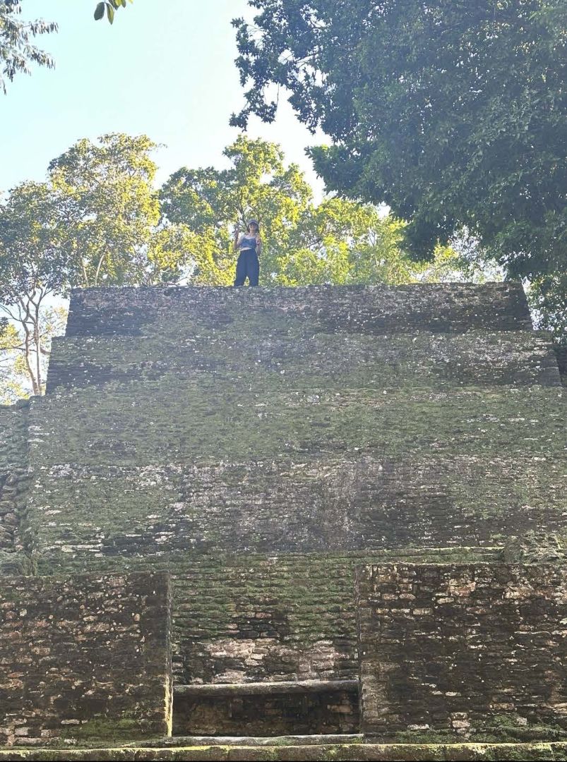 Audrey standing on top of a Mayan ruin