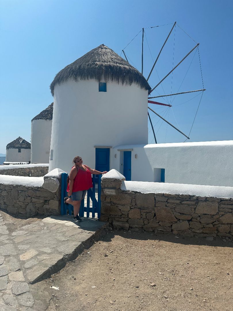 Jessica standing in front of a windmill in Hungary