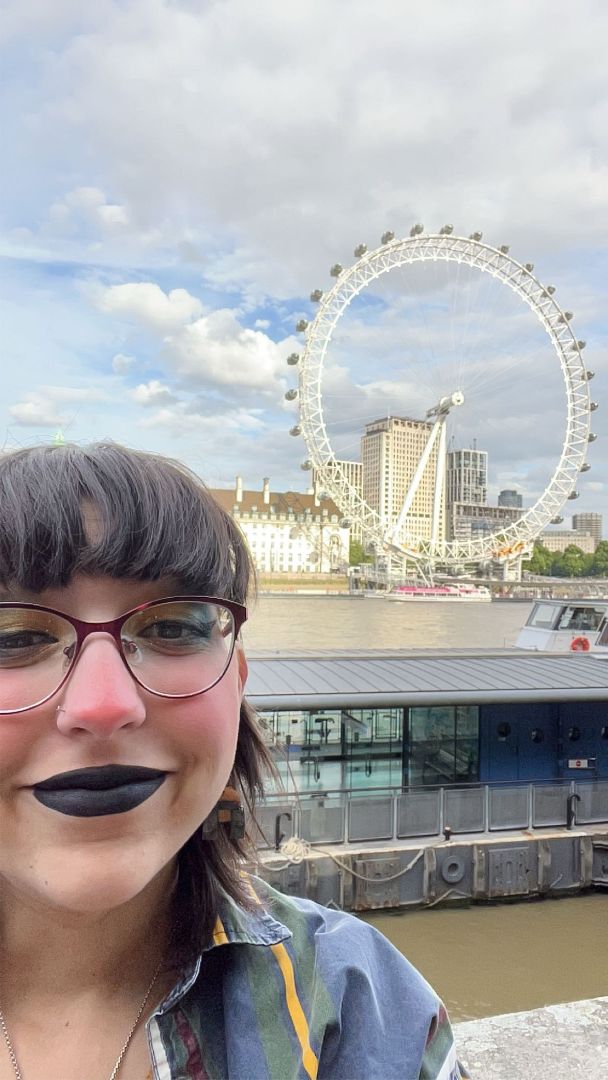 Ray taking a selfie with the London Eye in the background