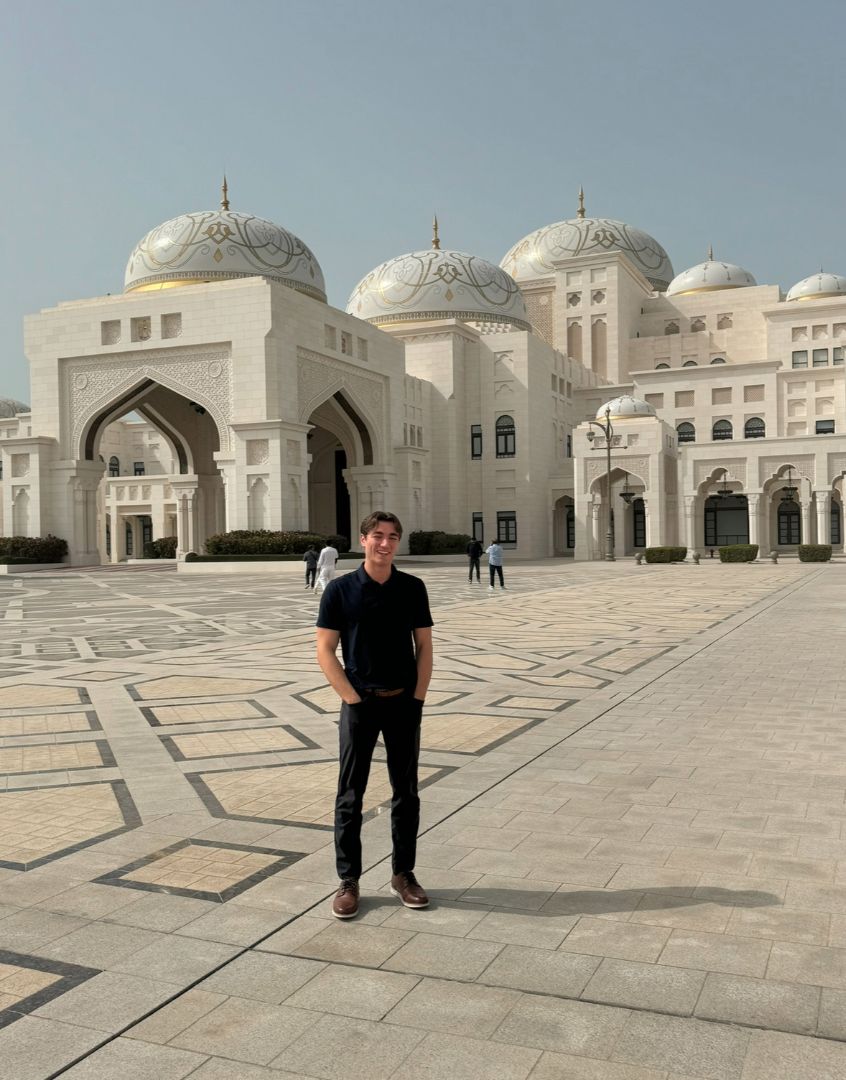 Eleftherios standing in front of a mosque in Dubai