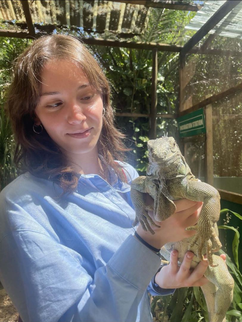 Audrey holding an iguana in Belize