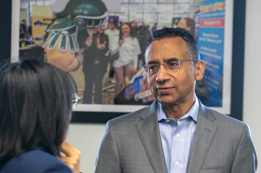 Lalwani speaking to person