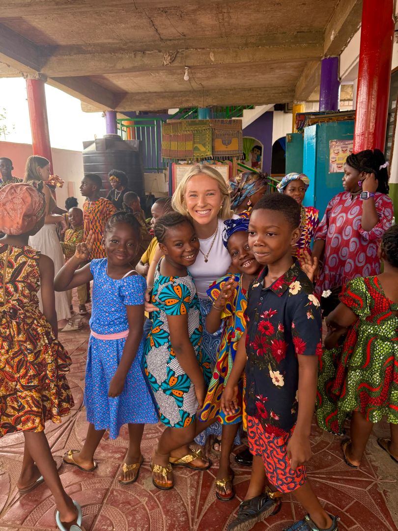 Kiana poses with local Ghanian children