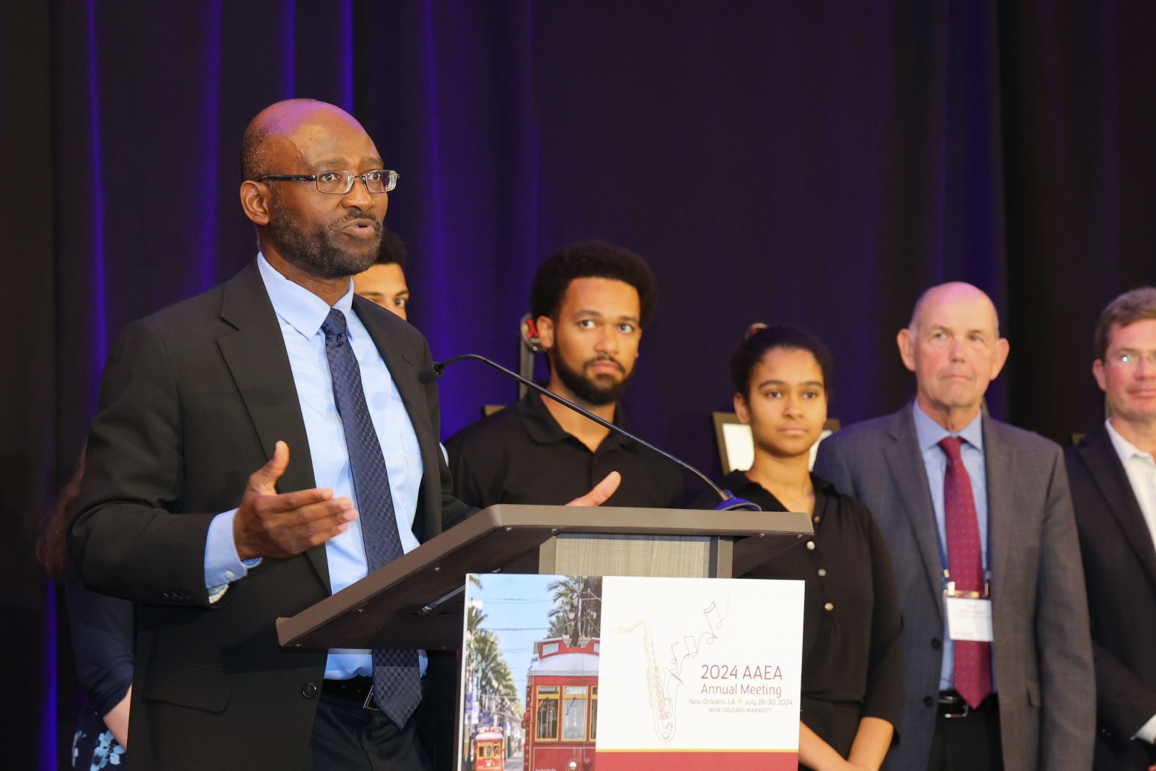 Titus Awokuse speaking at a lecture