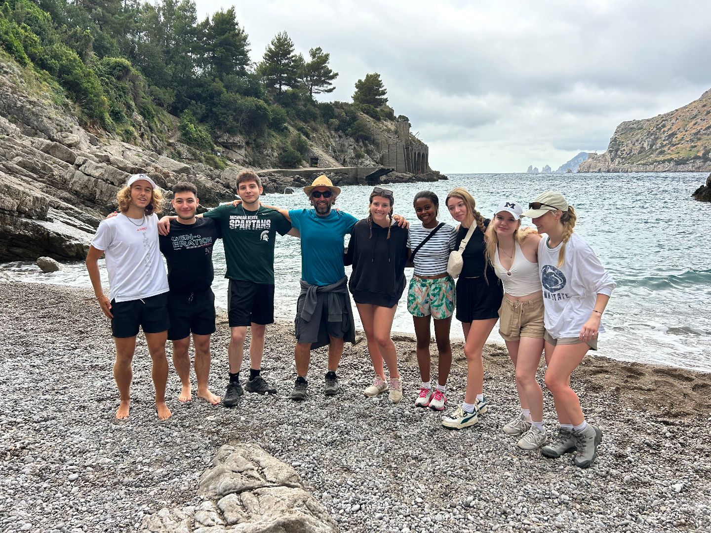 Madeline and friends on the coast of Italy