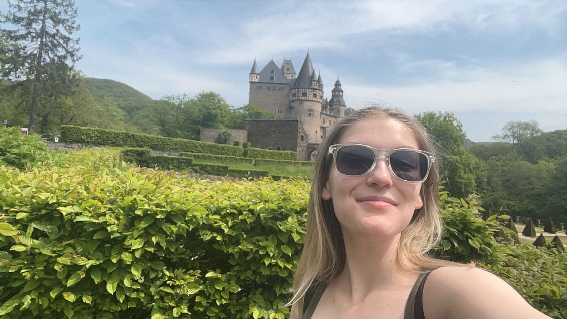 Paige taking a selfie in front of a German castle