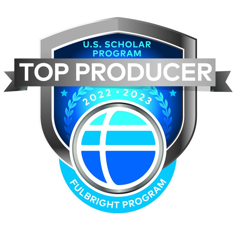 Blue, white and gray Fulbright logo/badge, text over a ribbon banner "Top Producer Fulbright Program U.S. Scholar Program 2022-2023"  