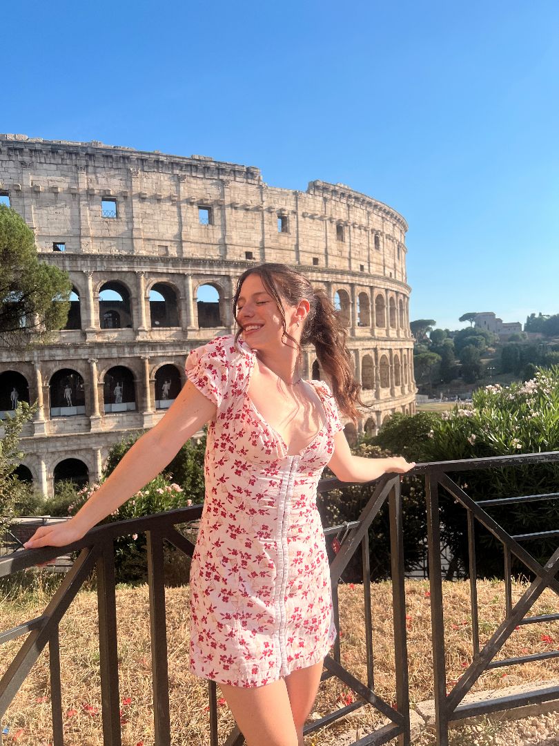 Flynn posing in front of the Roman Colesium