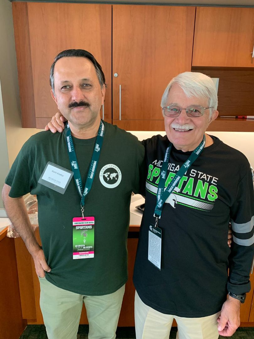 Rohit Khattar poses with friend David Horner, both are wearing Spartan gear jpg