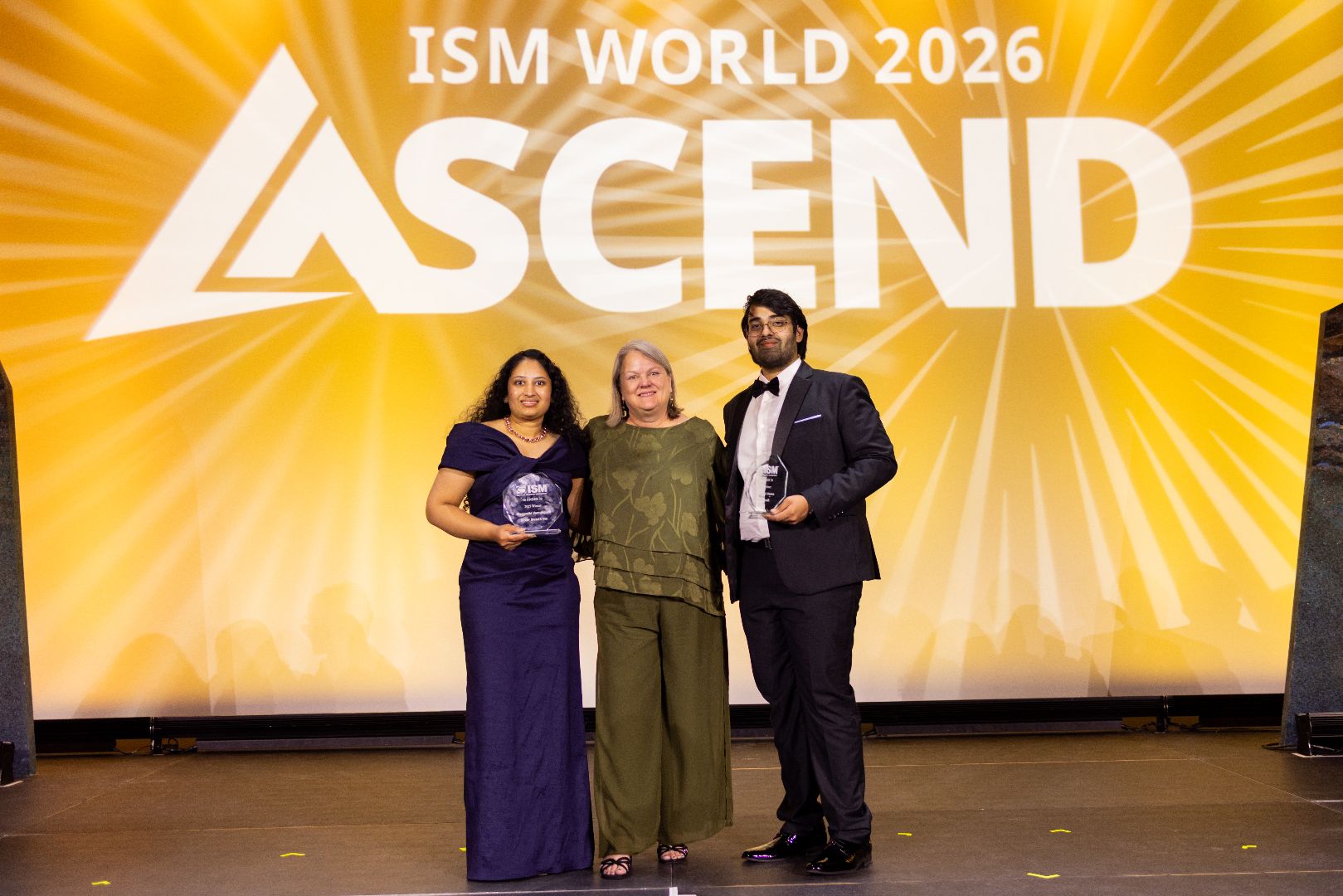 Rochi Varma and Sivajyothi Vemulapalli on stage with their awards at the ISM Ascend Conference