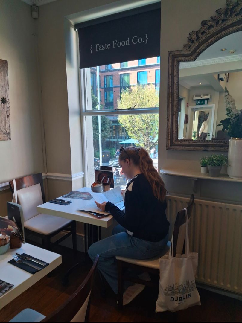 Juliette studying at desk in her dorm room in Dublin