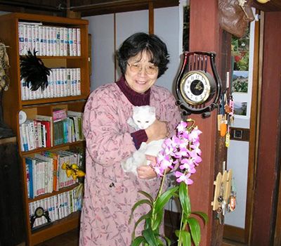 woman holding cat