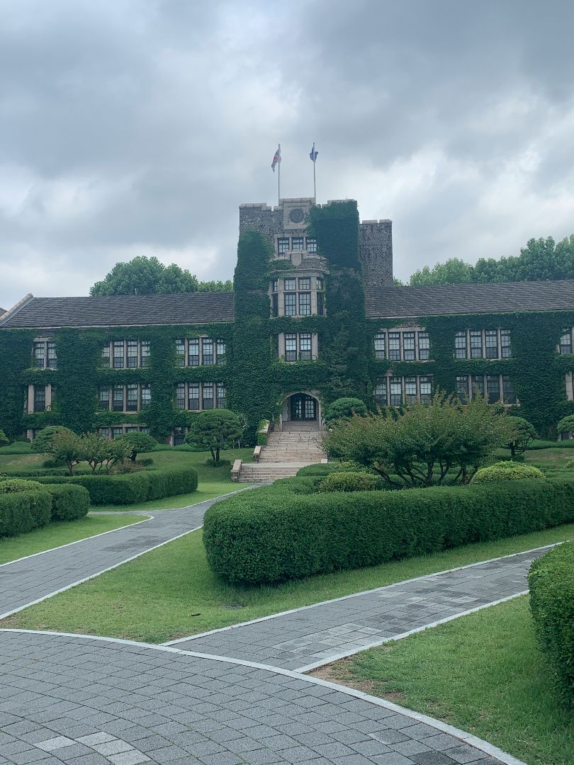 Brick building covered with ivy on Yonsei University campus