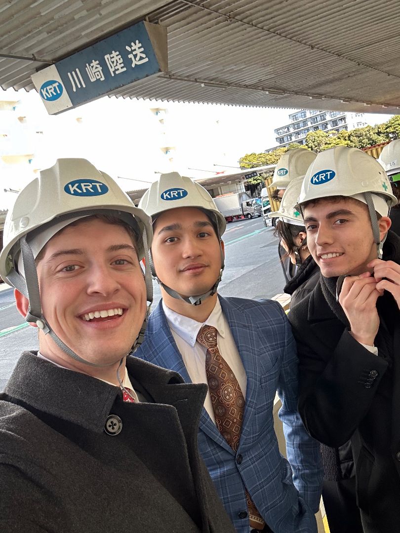 Three students wearing KRT hard hats in Japan