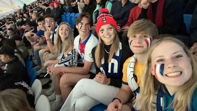 Gavyn and friends at a soccer game in Australia