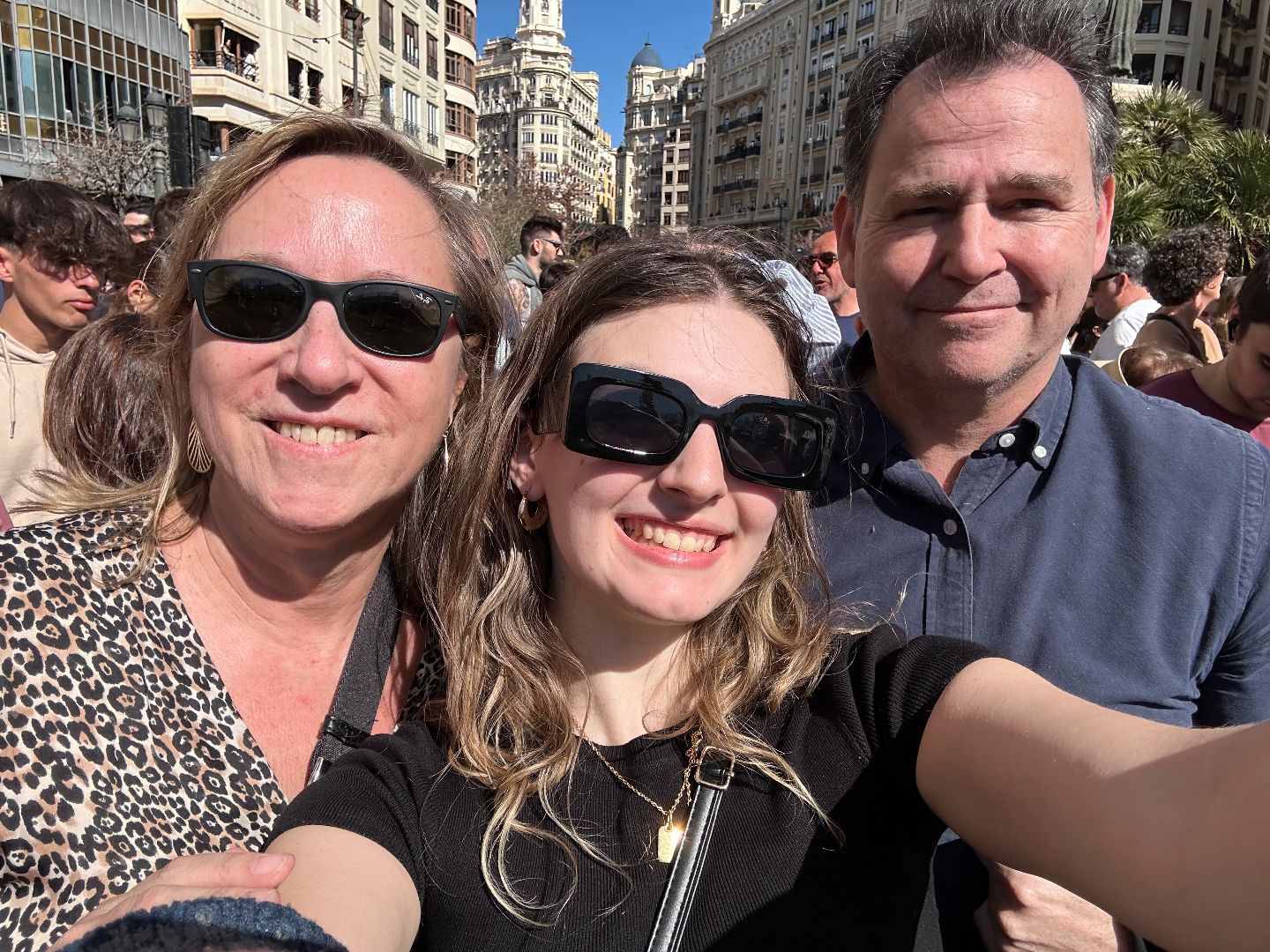 Caitlin taking selfie with host family in Spain