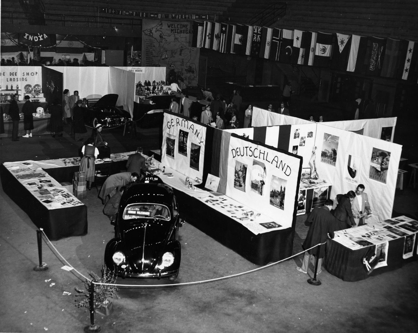 An old photo of a past Global Festival exhibit featuring a German car
