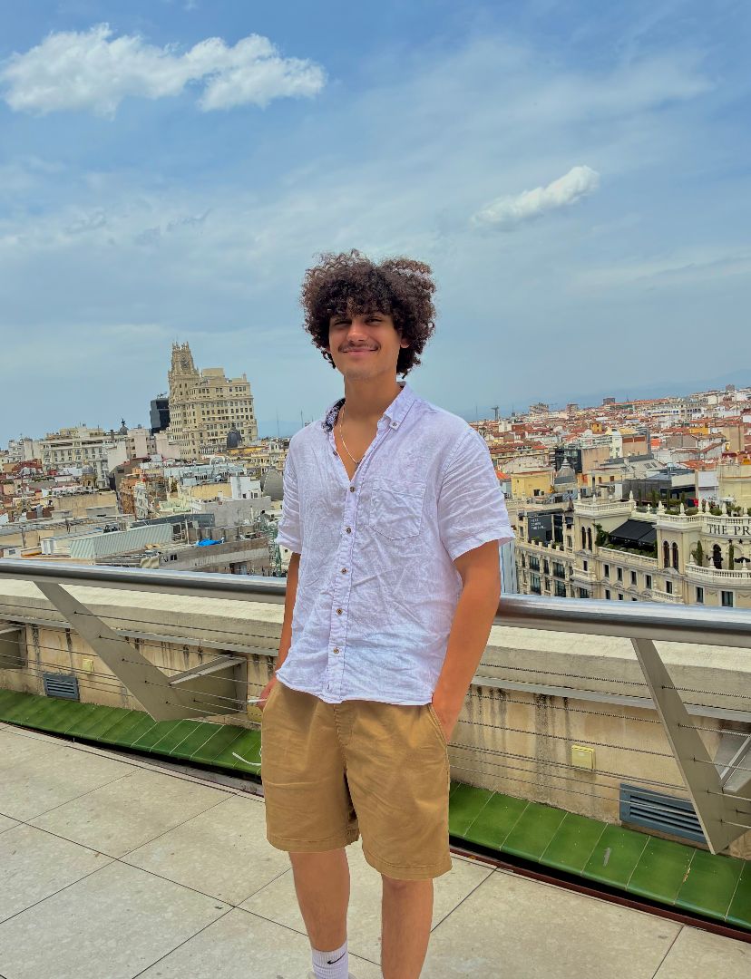 Ruben standing at the top of a building in Spain