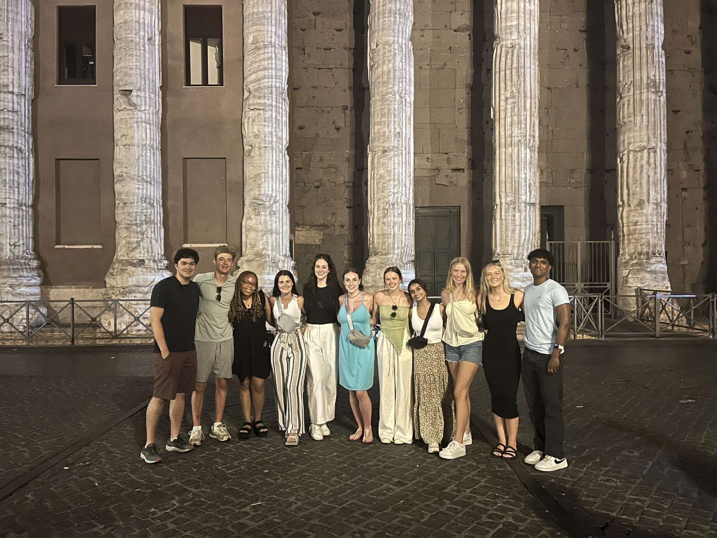 Group of students in front of the Panthenon at night