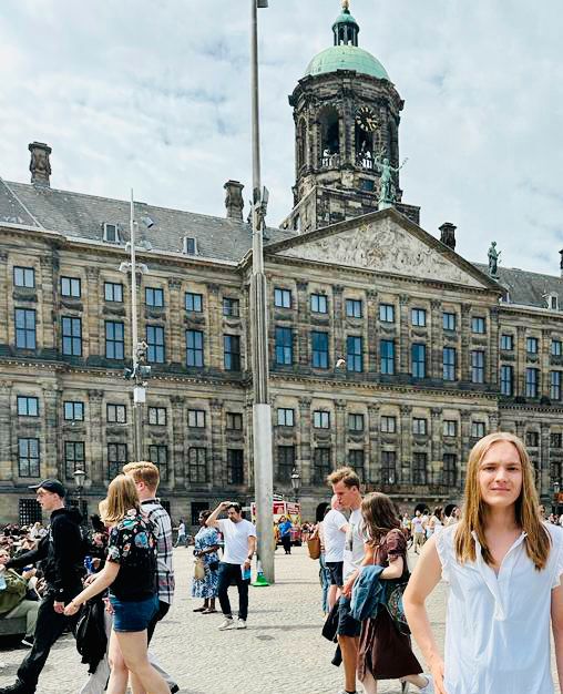 Jameson standing in front of the Royal Palace of Amsterdam