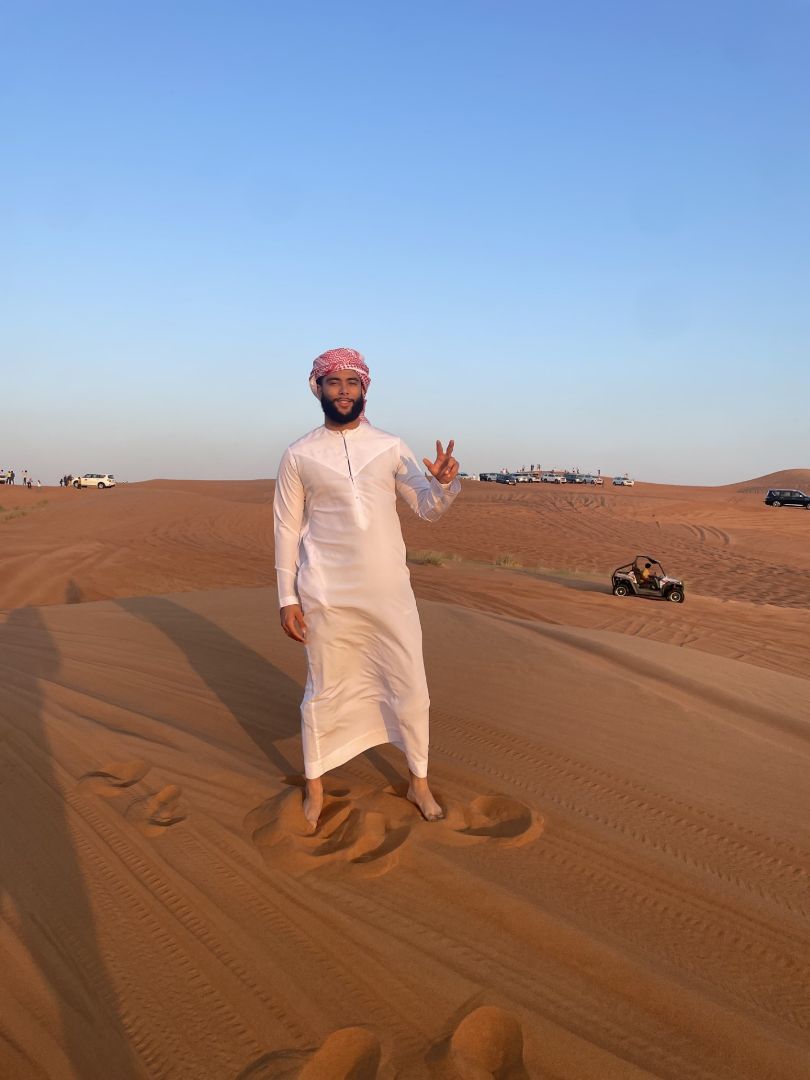 Stoney standing in the desert in the UAE