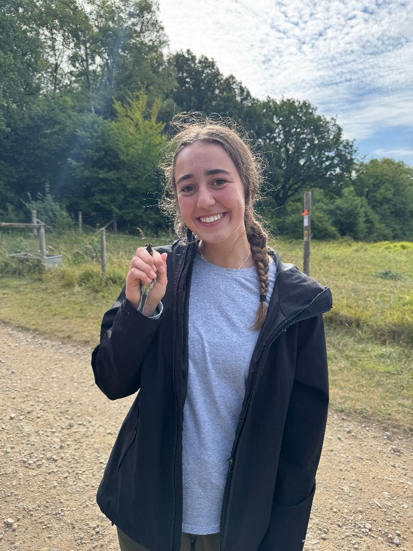 Grace holding a small bird
