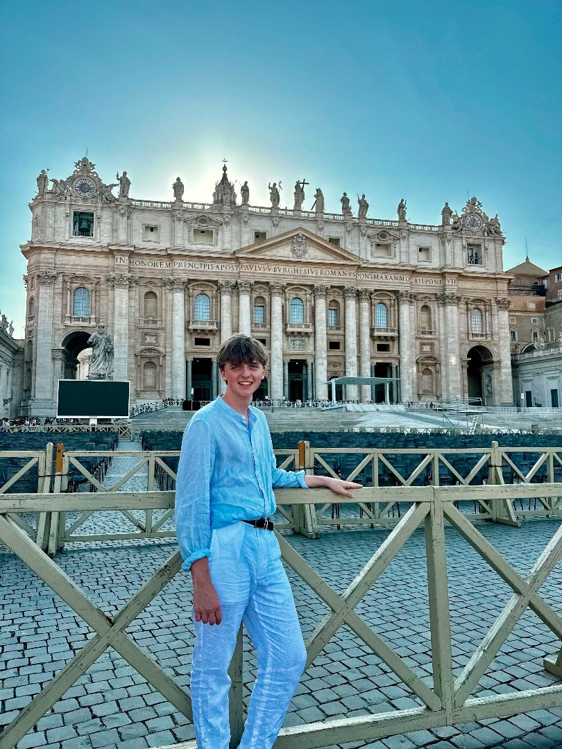 Josh standing in front of the Vatican in Rome