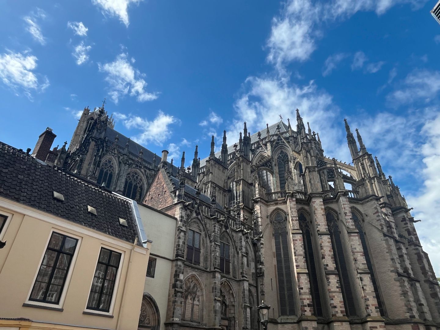Looking up at a very ornate church 