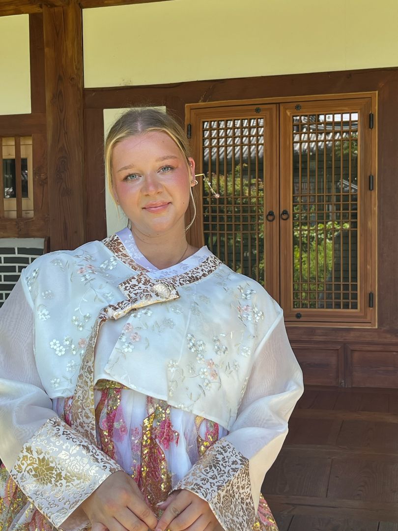 Destiny posing in a traditional korean dress