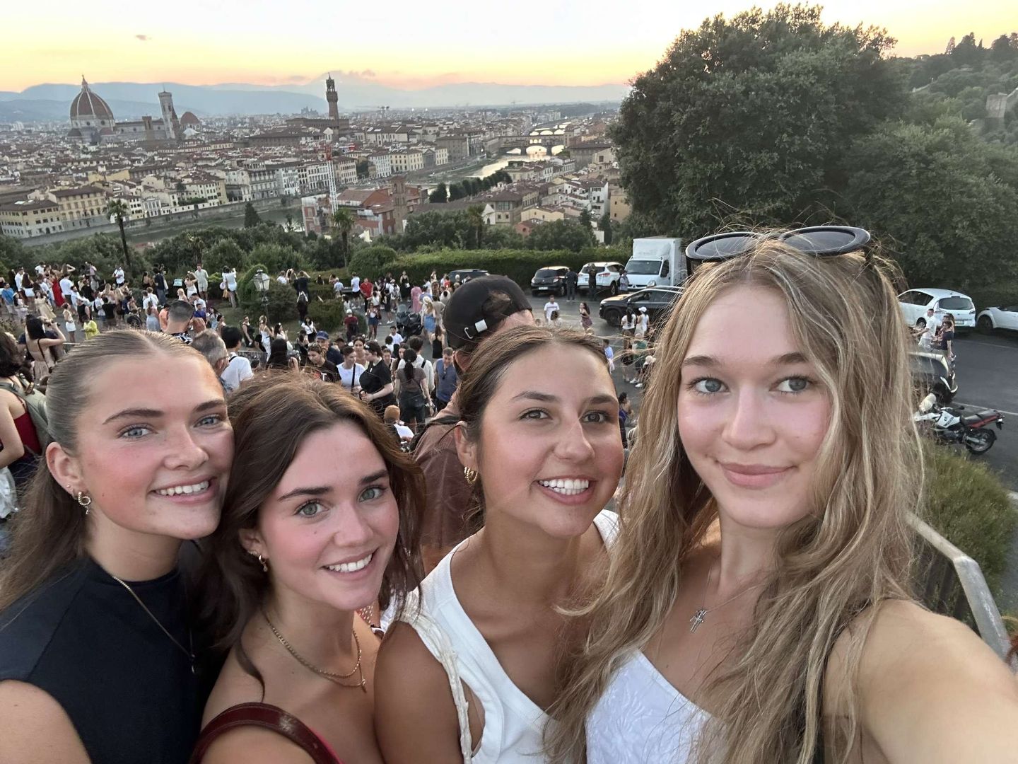 Aleah and three friends taking a selfie over looking Florence