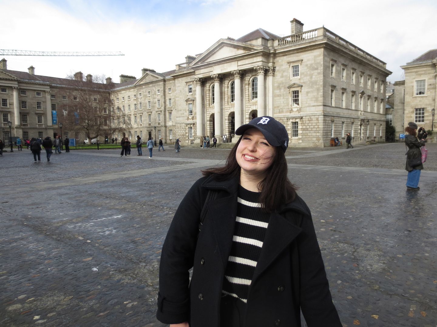 Caroline wearing a Detroit Tigers baseball hat in Dublin, Ireland