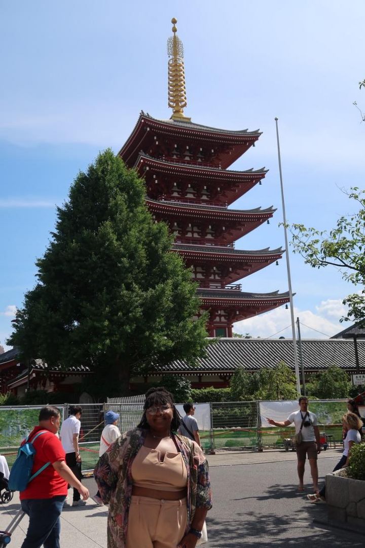 Keiara standing in front of Senso, the oldest Buddhist Temple in Tokyo