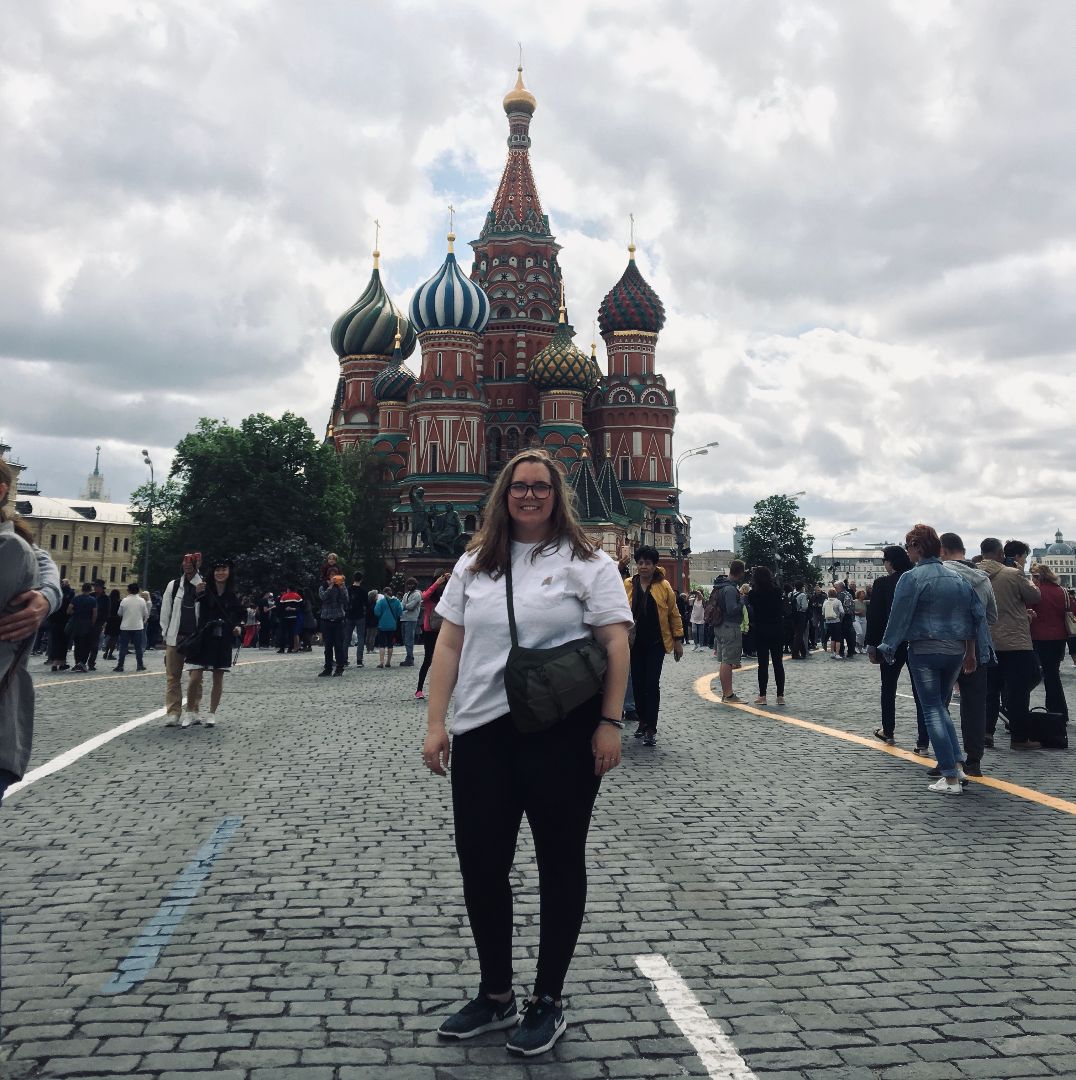 Garland standing in front of Kremlin in Russia