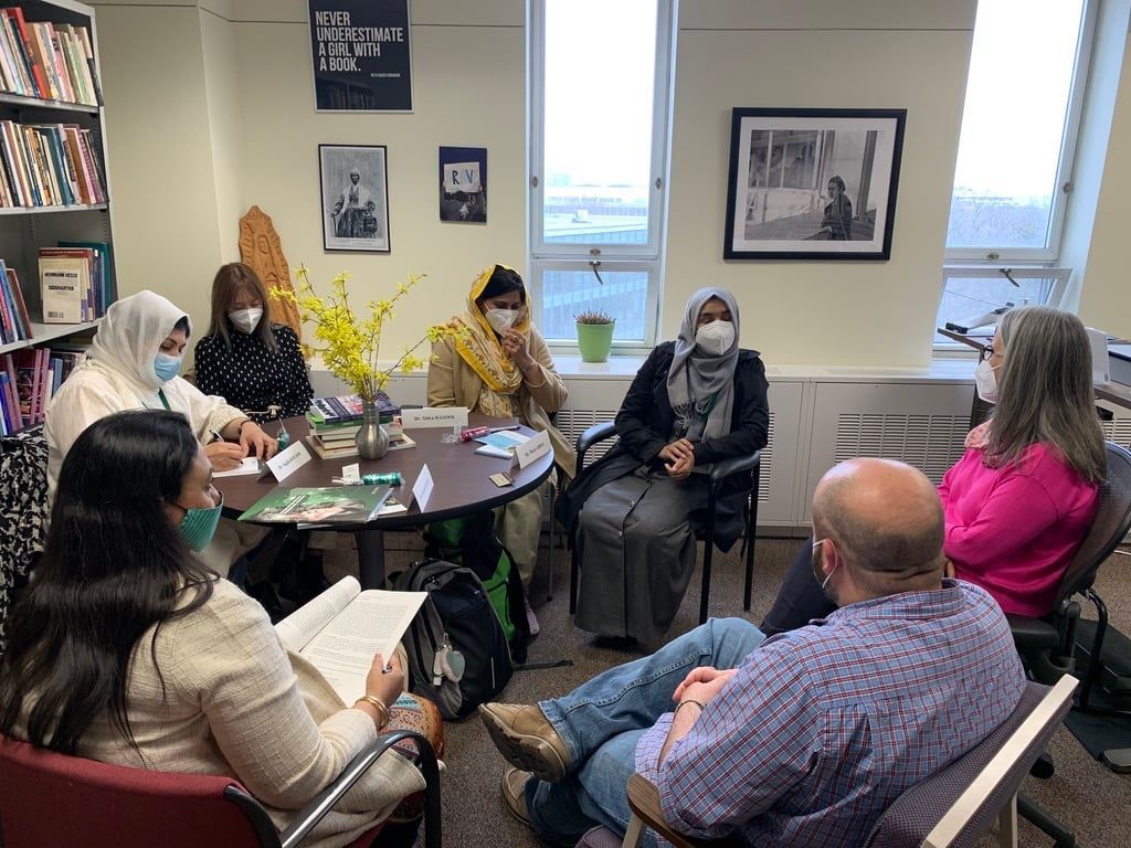 Group of people having a discussion in an office