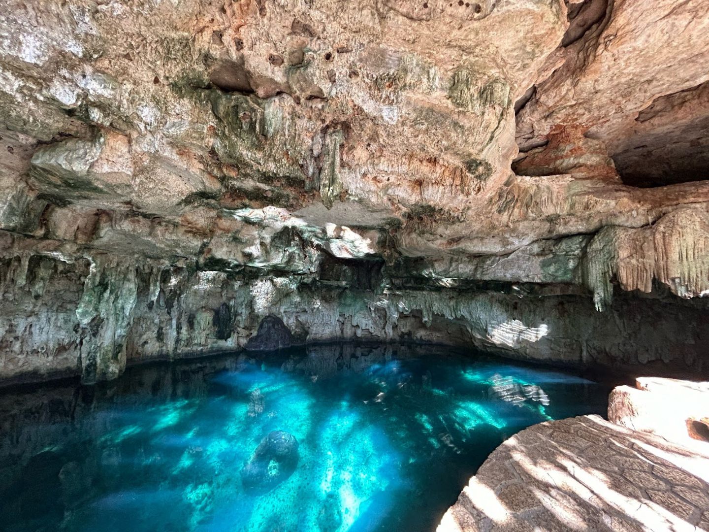 Underwater cave with bright blue water in Mexico