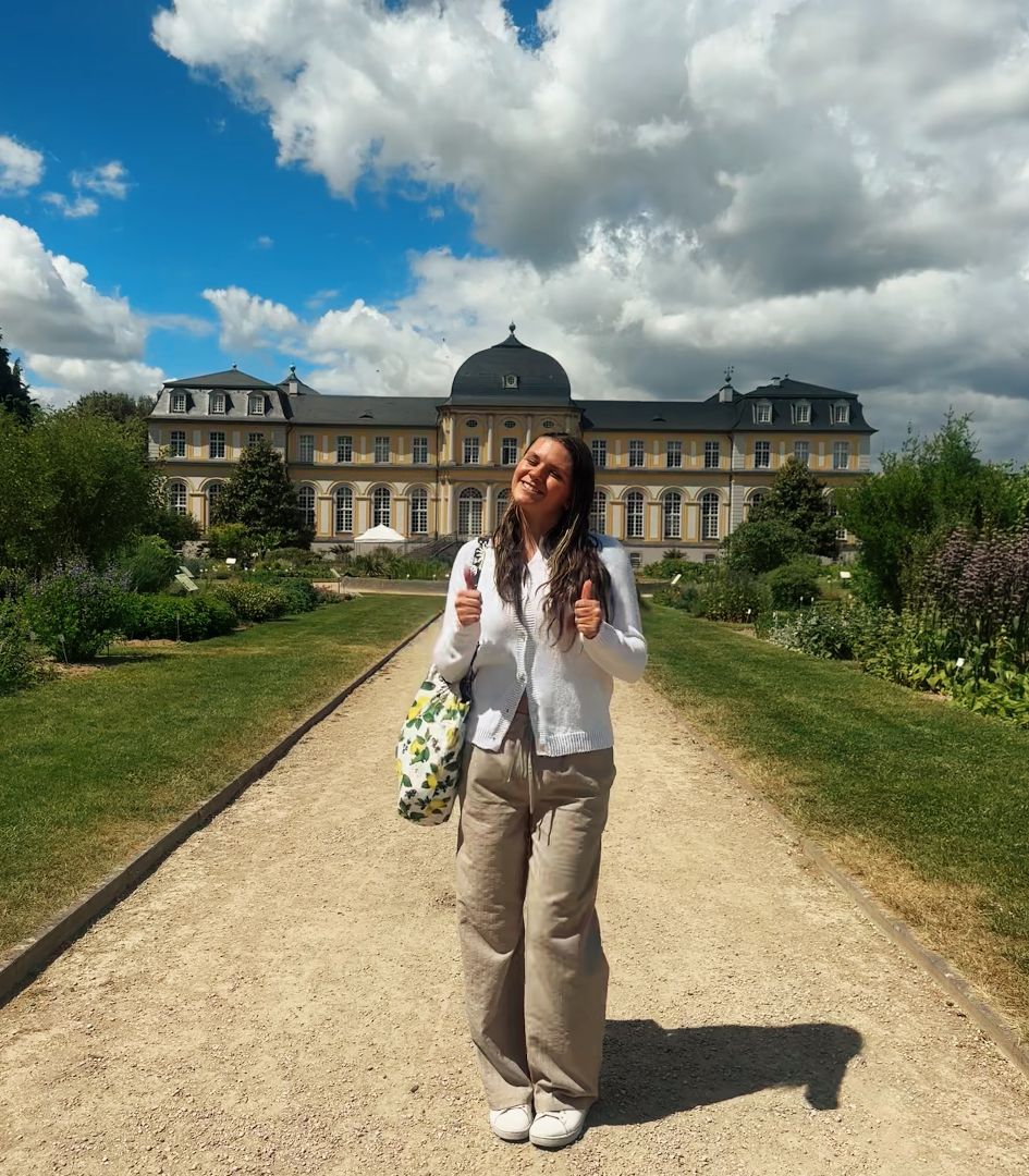 Emma posing in front of an ornate German building