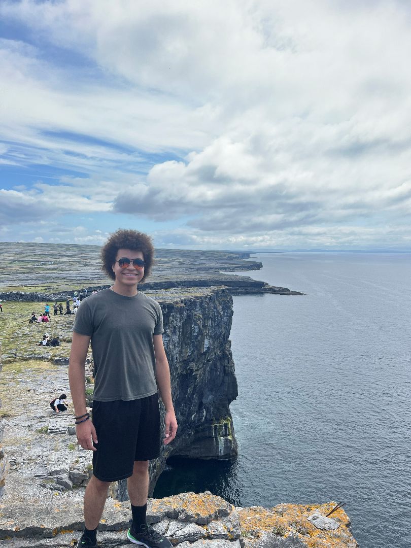 Robert standing on the Cliffs of Moher in Ireland