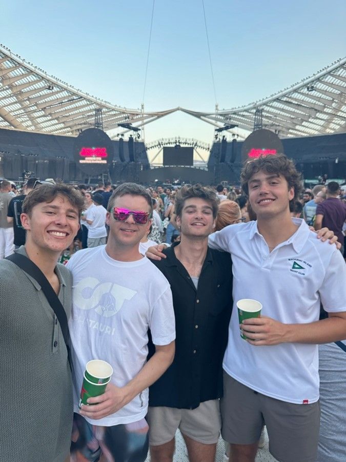 Nicholas and friends at a music concert in Greece