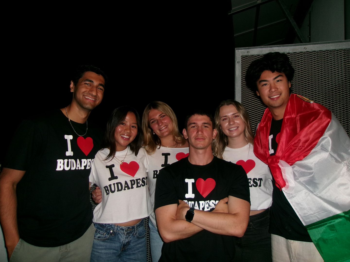 Zoe with a a group of friends all wearing an I LOVE BUDAPEST shirt